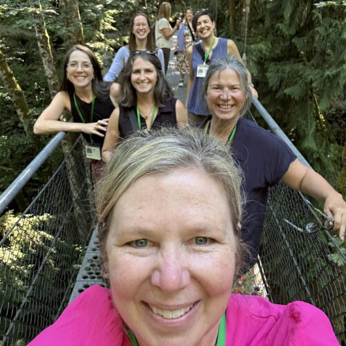 Sustainable Design Leaders selfie on bridge at 2024 Summer Share