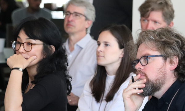 Small group engaged at Green Commons Super Summit 2025