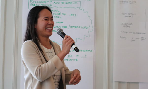 Woman presenting at Green Commons Super Summit 2025